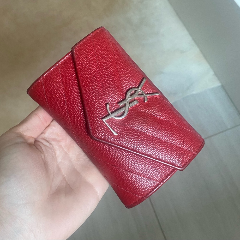 Used red YSL wallet, bought on Rodeo Drive.